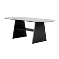Moderne ovale eettafel met zwart metalen onderstel en marmeren blad