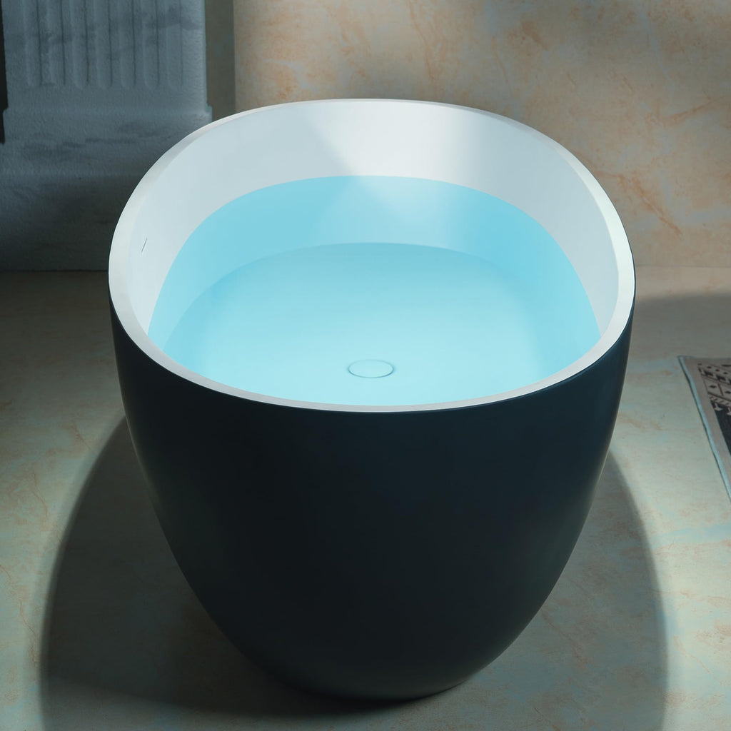 WOODBRIDGE 61" Stone Resin Freestanding Soaking Tub, Modern Oval Solid Surface Bathtub with Integrated Slotted Overflow & Drain, Matte White