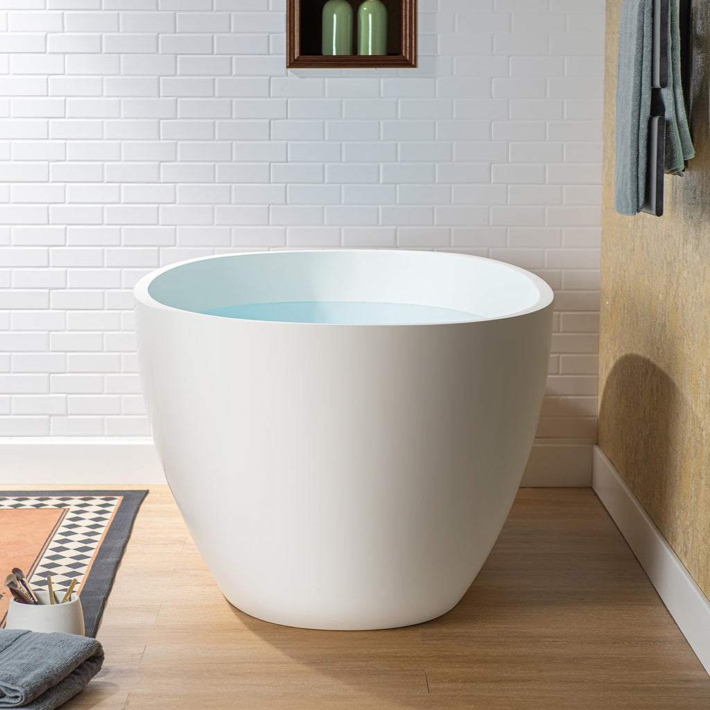 WOODBRIDGE 61" Stone Resin Freestanding Soaking Tub, Modern Oval Solid Surface Bathtub with Integrated Slotted Overflow & Drain, Matte White