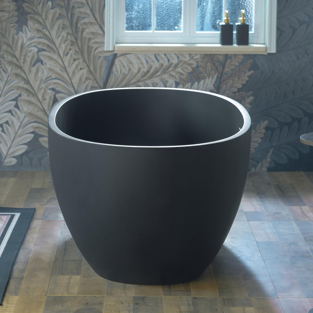 WOODBRIDGE 61" Stone Resin Freestanding Soaking Tub, Modern Oval Solid Surface Bathtub with Integrated Slotted Overflow & Drain, Matte White