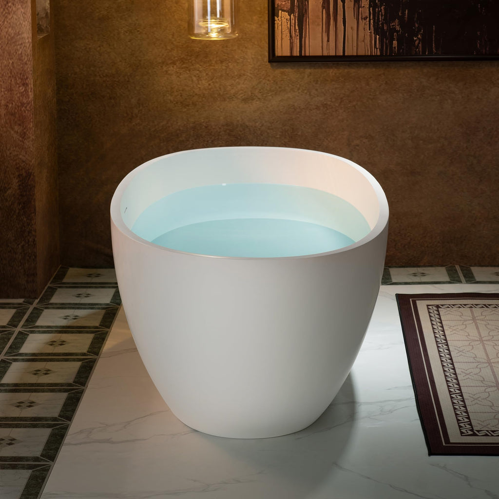 WOODBRIDGE 61" Stone Resin Freestanding Soaking Tub, Modern Oval Solid Surface Bathtub with Integrated Slotted Overflow & Drain, Matte White