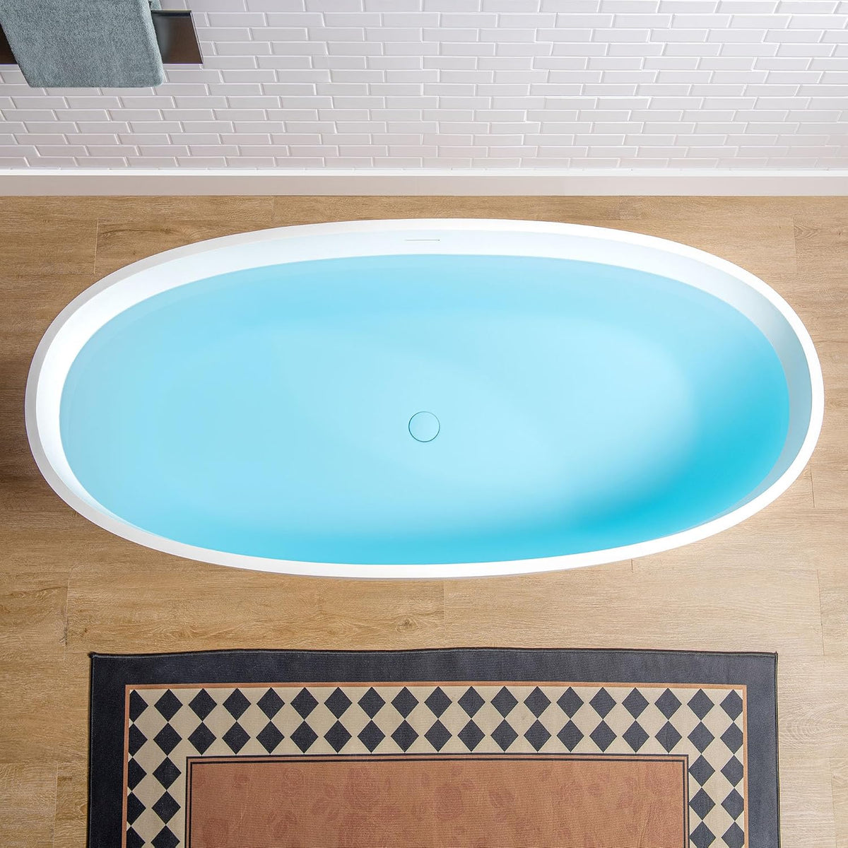 WOODBRIDGE 61" Stone Resin Freestanding Soaking Tub, Modern Oval Solid Surface Bathtub with Integrated Slotted Overflow & Drain, Matte White